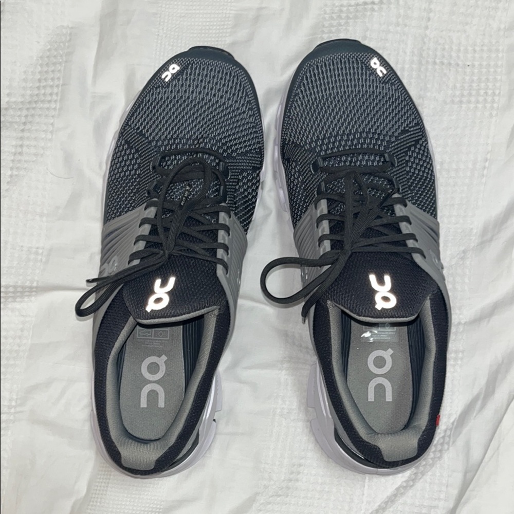 On Running Black and Gray Athletic Shoes with CloudTec Cushioning